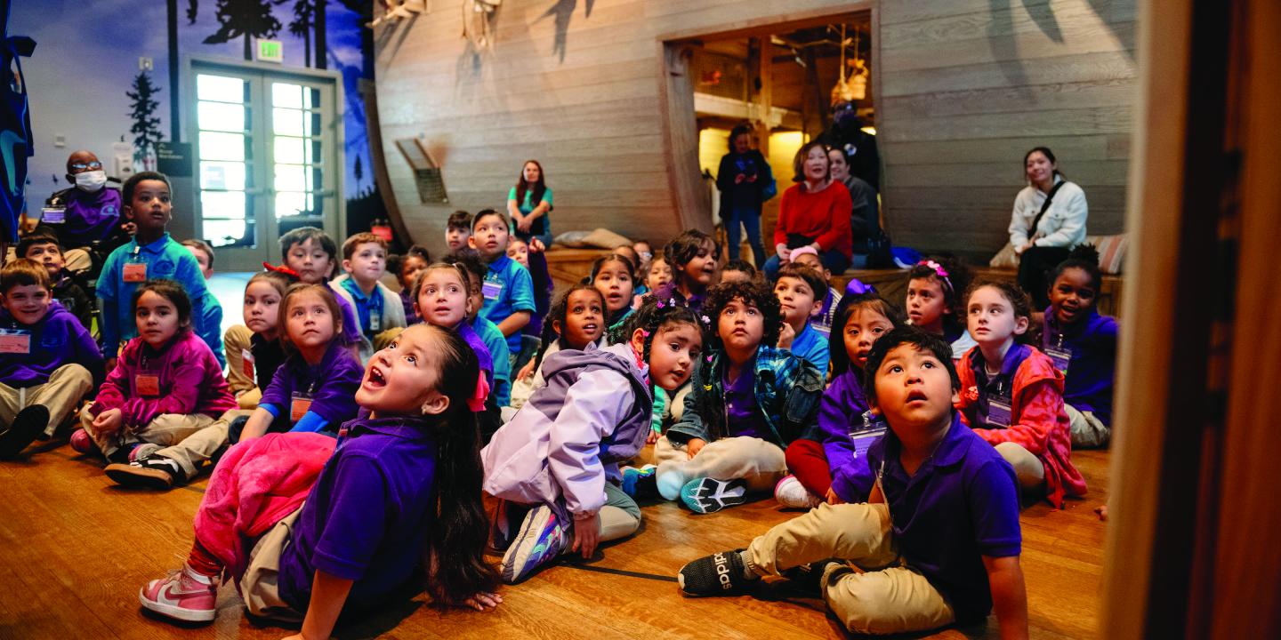 Students sit in Noah's Ark.